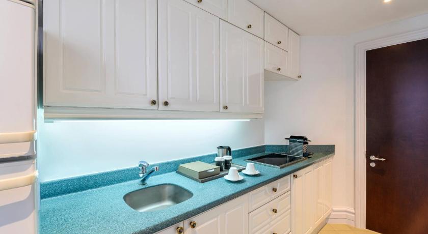 Image of Amiri Suite, 1 Bedroom Suite, 1 King, Pool view, Balcony 15