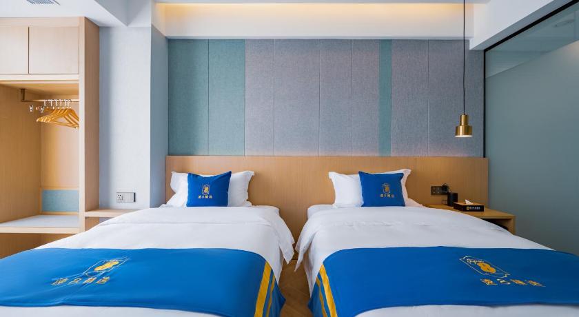 싼야 Super 8 Selected Hotel Sanya Bay Coconut Dream Corridor 호텔 스위트룸