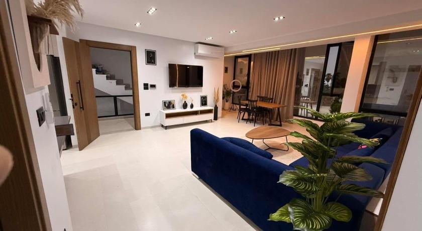 Appartement Luxe S2-900m-plage-Fibre-Smart TV-Parking prive