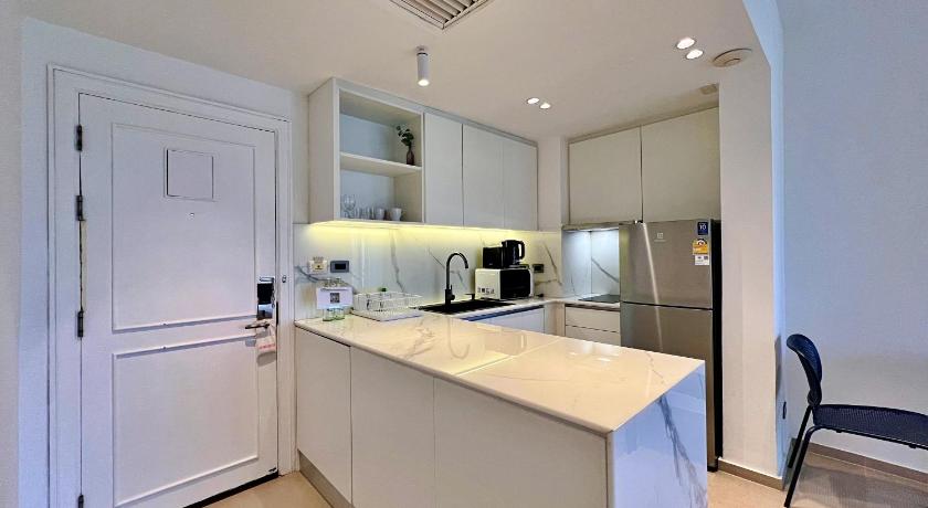 Фото: Номер Делюкс с 1 спальней (1 Bedroom Deluxe) 1