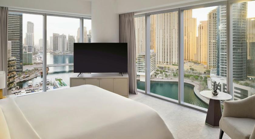 Image of Premier Marina View Suite, King bed, Sofa bed, Club lounge access with Breakfast, Lunch & Dinner, 4PM Late checkout, Including direct access to Dubai Marina Mall & Marina Walk 5