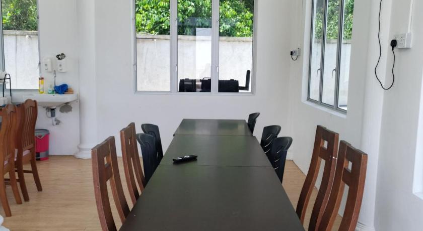 둥군 Aimers Lodge 3성급 게스트하우스 레스토랑