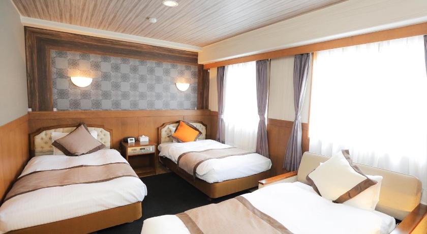 Image of Triple Room - Non-Smoking 0