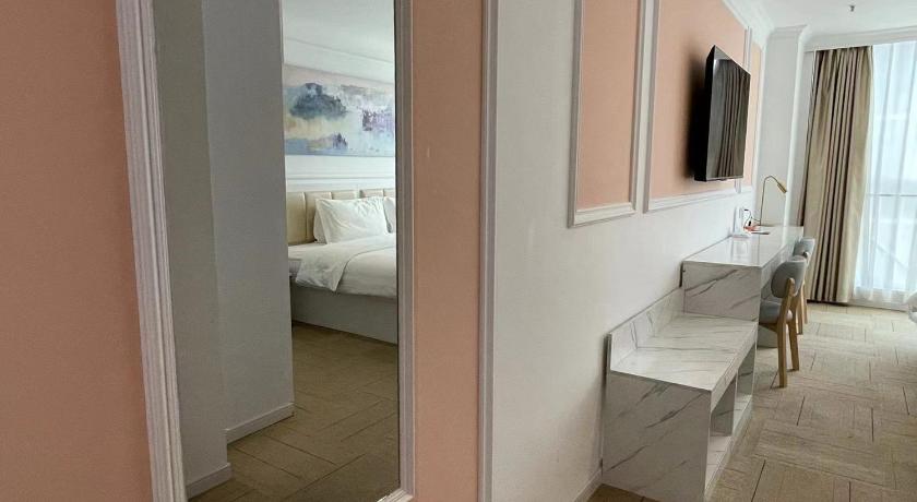 Фото: Двухместный номер Делюкс с 2 отдельными кроватями (Deluxe Twin) 14