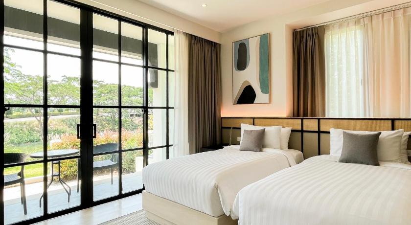 รูปของดีลักซ์ คอร์เนอร์ เตียงแฝด (Deluxe Corner Twin Room) 1