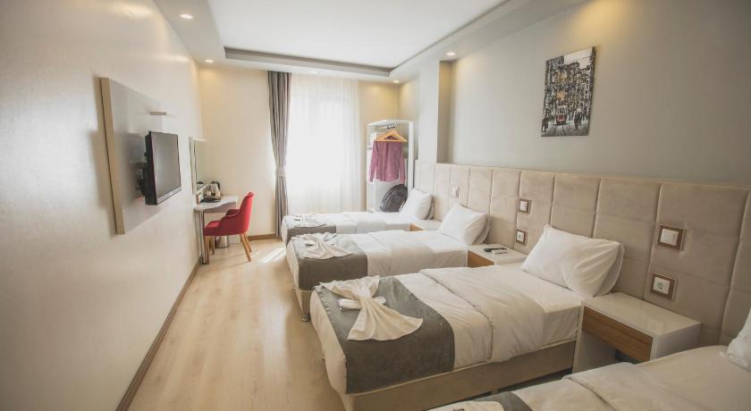 Image of Deluxe Quadruple Room 0