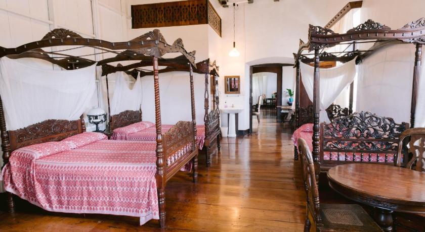 Image of Triple Room with Private Bathroom 0