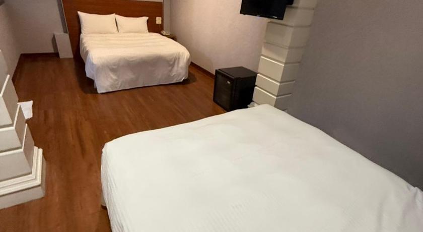 Image of Budget Quadruple Room (No Window.No parking space) 1