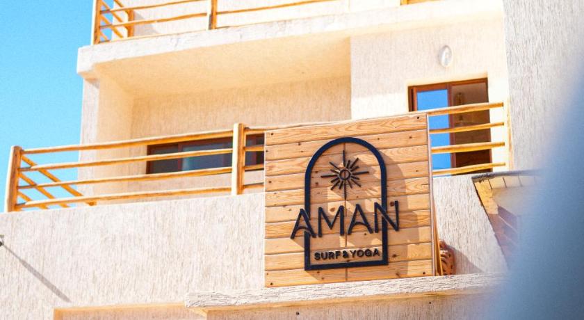 Aman surf paddle yoga