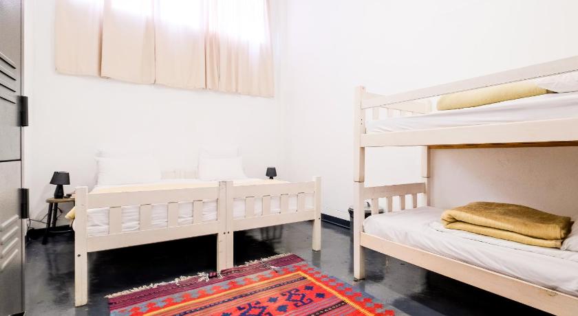 Image of Economy Quadruple Room with Shared Bathroom 2