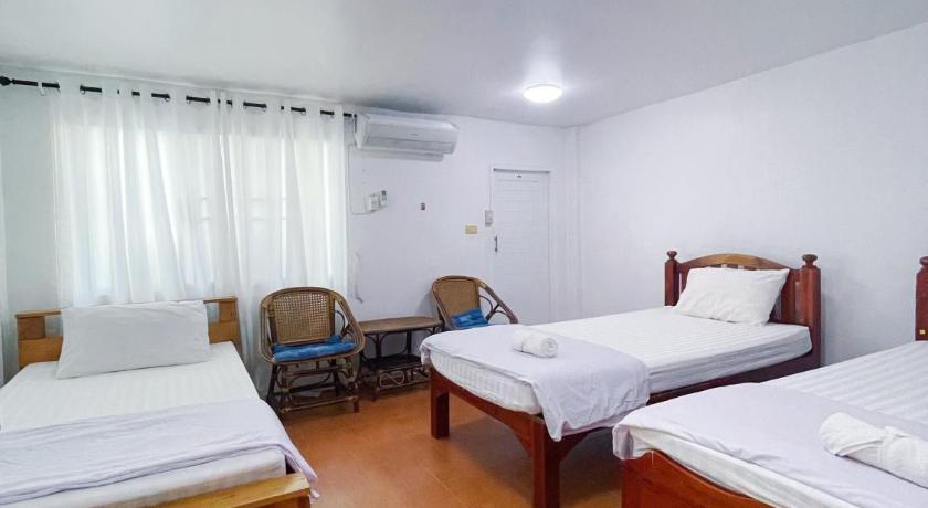 Image of Triple Room with Private Bathroom 0