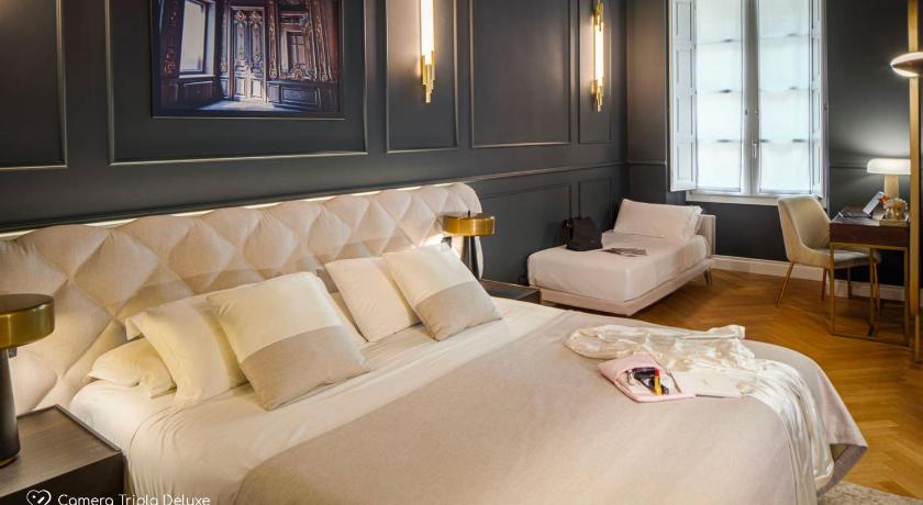 Image of Deluxe Triple Room 0