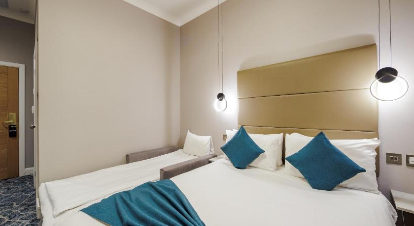 Image of Habitación Triple Executive (Executive Triple Room) 5