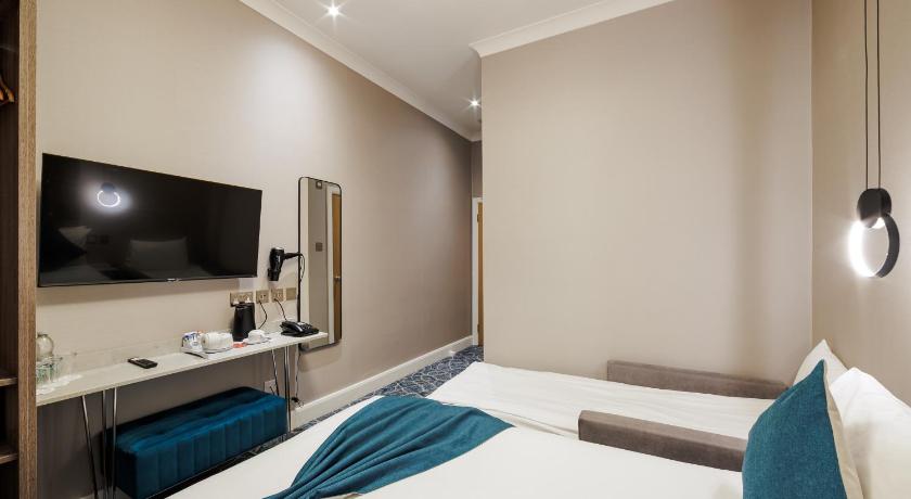 Image of Habitación Triple Executive (Executive Triple Room) 7