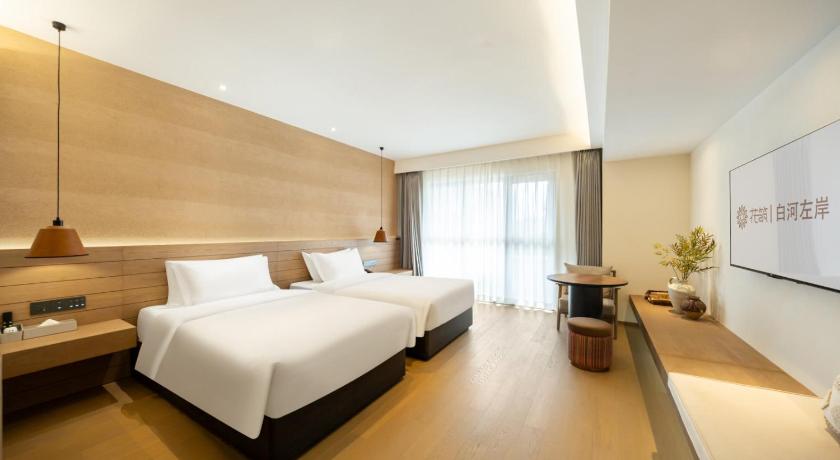 延辺 Floral Hotel Changbaishan Baihe Left Bank ゲストハウス 外観