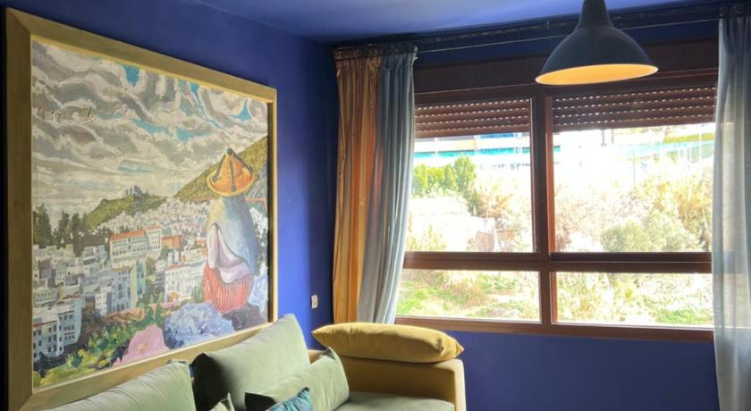 Image of Deluxe Suite with River, Mountain and City View 0
