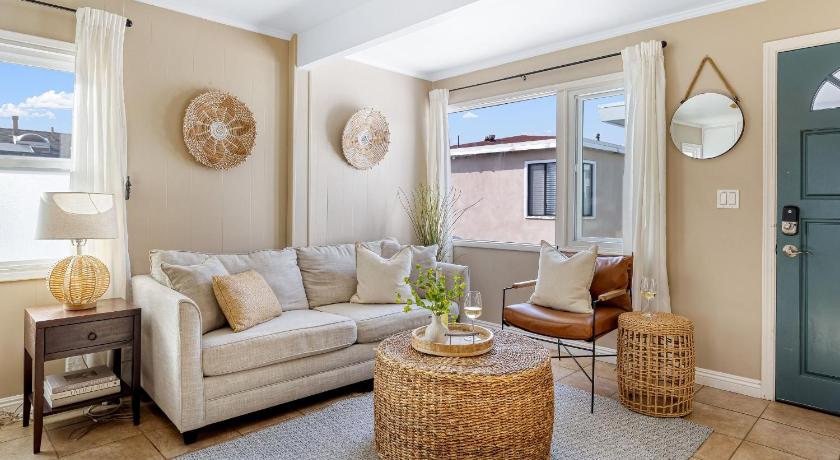 Waterfront Views Shared Dock Short Walk to Beach Shops Surf Edgewater B by AvantStay