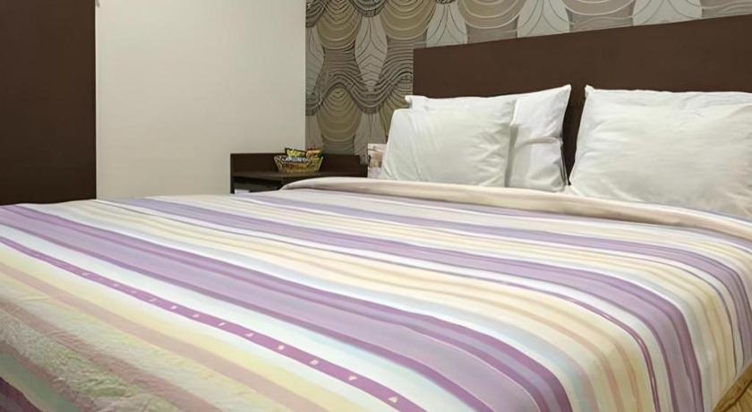 マカッサル Vindhika Hotel 1つ星 ホテル 客室