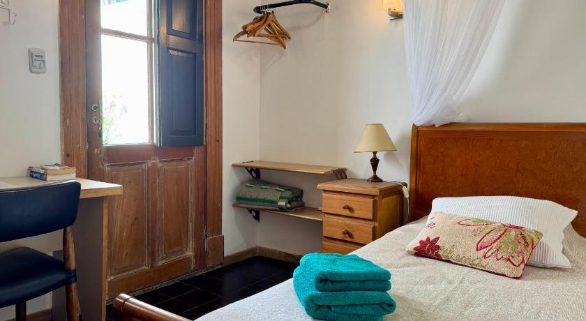 Imagem de Quarto Individual com Varanda (Single Room with Balcony) 0