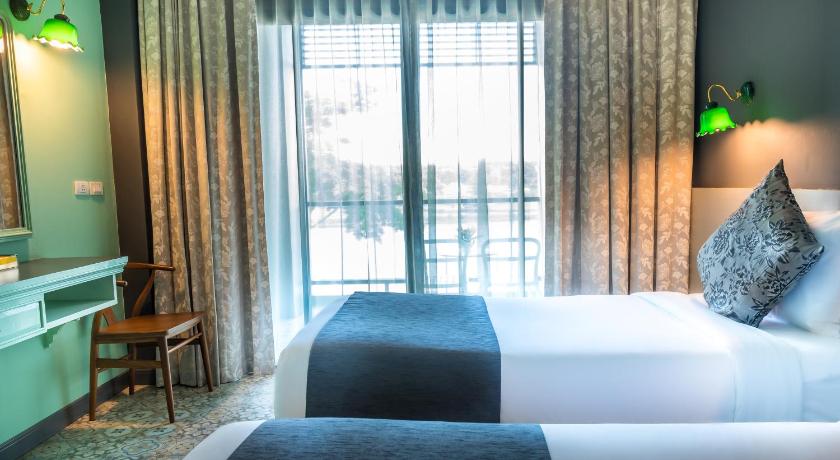 Image of Deluxe River View Twin Room with Balcony 3