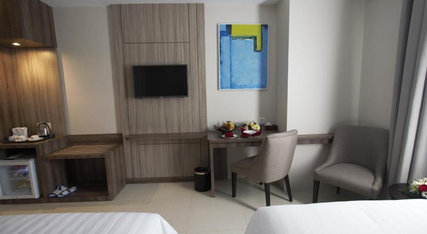 Foto Kamar Deluxe dengan Kasur Twin (Deluxe Twin Bed Room) 6