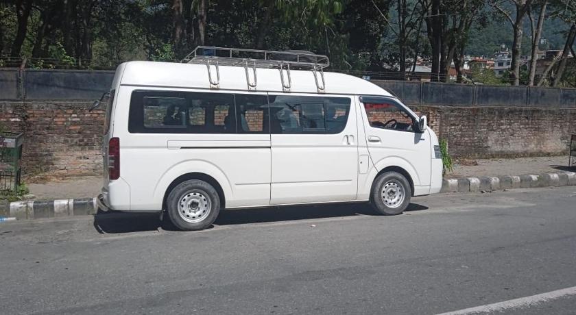 Affordable Hotels Near Khusibu Bishnumati Kinar Right in Kathmandu — 12 seater micro van EV