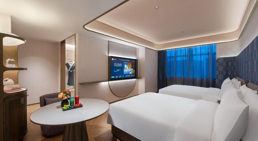 옌타이 / 연대 Manxin Hotel Wuyue Plaza Yantai Railway Station 호텔 로비