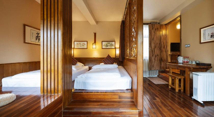 Image of Deluxe Family Suite with Balcony 0