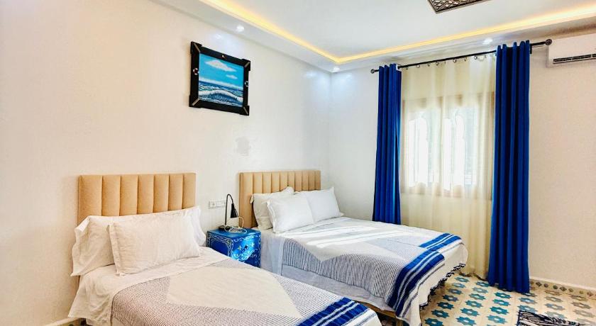 Image of Quadruple Room with Shower 2