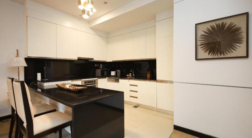 Image of One-Bedroom Apartment with Balcony and Water View 13