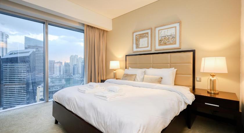 Image of One-Bedroom Apartment with Balcony and Water View 0