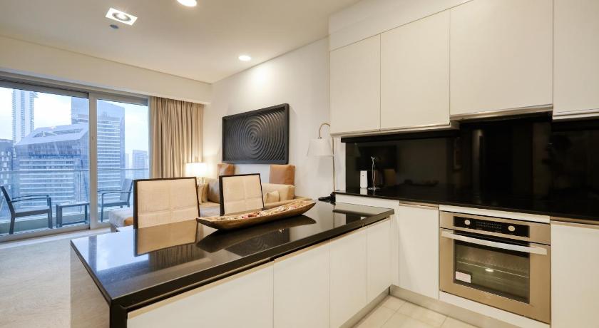 Image of One-Bedroom Apartment with Balcony and Water View 1