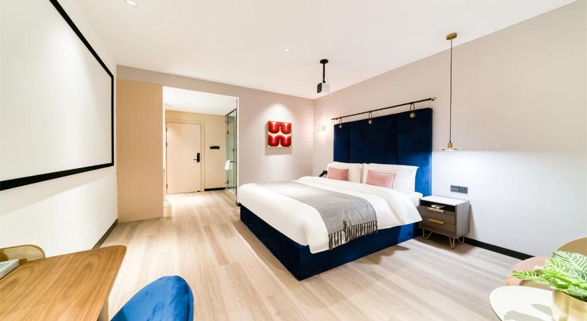 상라오 五悦悦心酒店吾悦广场经开区店Wuyue Yuexin Hotel, Shangrao Wuyue Plaza Economic Development Zone Branch 호텔 스위트룸