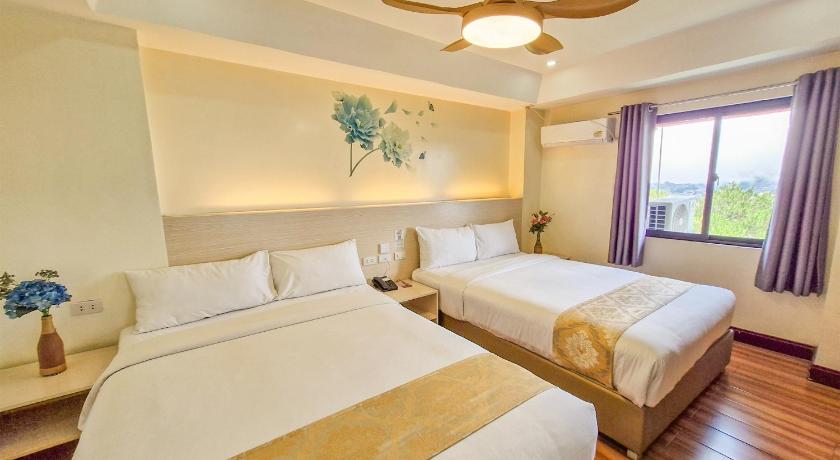 Image of Deluxe Quad Room 0