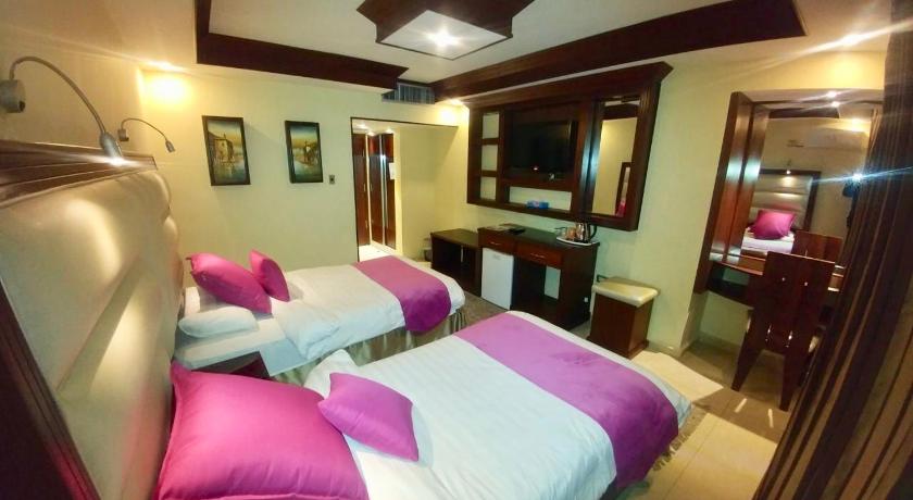Imagem de Quarto triplo Deluxe (Deluxe Triple Room) 8