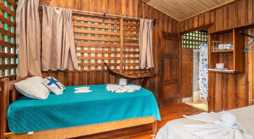 Image of Triple Wooden Cabin with Partial Sea View 10