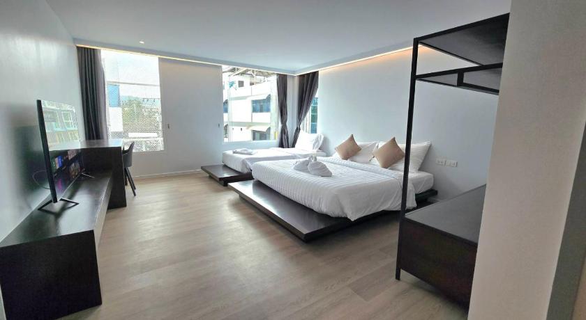Image of Triple Room with Private Bathroom 3