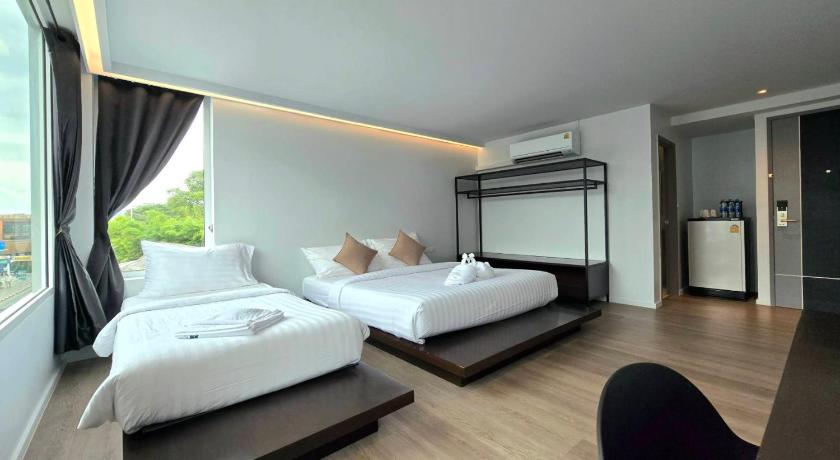Image of Triple Room with Private Bathroom 0