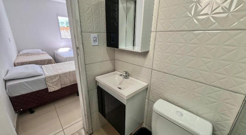 グアルジャ Recanto Temporada Guaruja 3つ星 ゲストハウス スイート