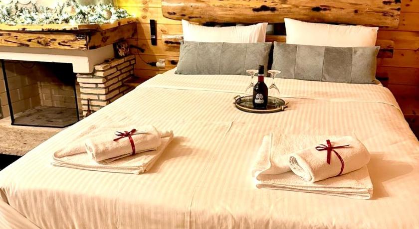 佩内奥斯 Suites Efharis Filoxenon 4星级 民宿 餐厅