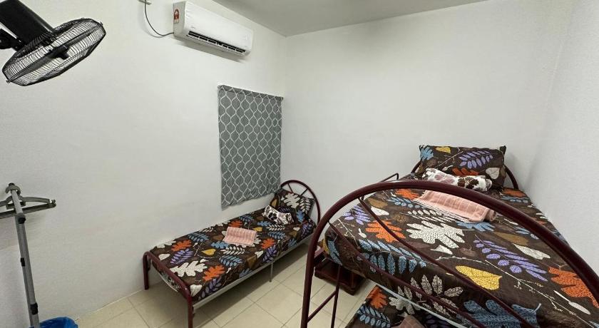 バトゥクラウ EmyNuar Homestay 3つ星 ゲストハウス 客室