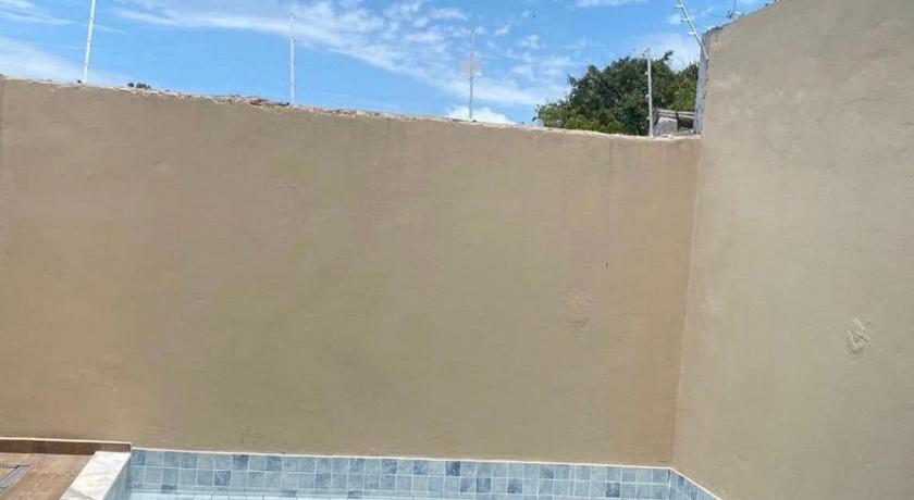 Linda casa a 100 metros da praia!