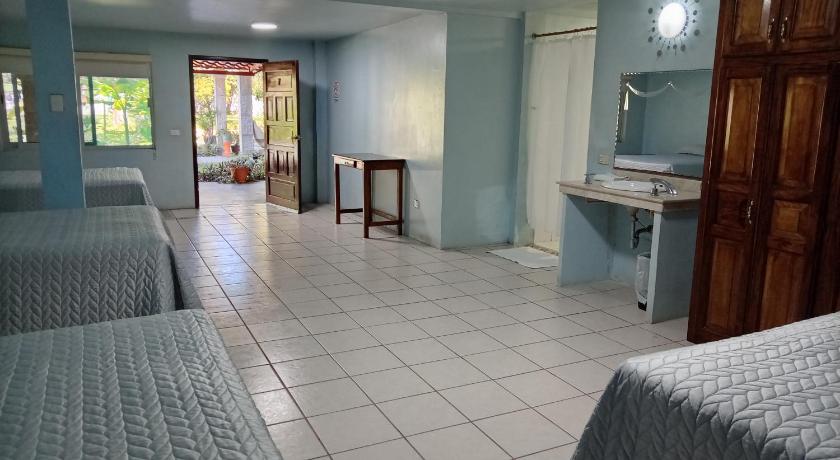 Image of Quadruple Room with Garden View 4