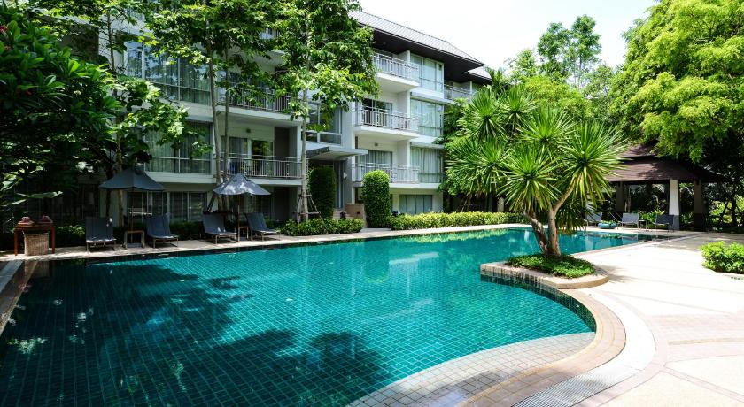 a large swimming pool in front of a large building, The Park Nine Hotel Srinakarin (SHA Plus+) in Bangkok