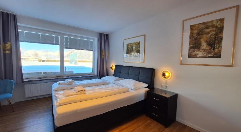 Image of Deluxe Two-Bedroom Apartment with Garden View 0