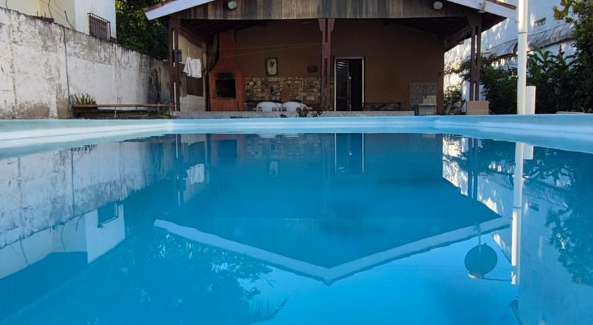 Casa com piscina perto da praia