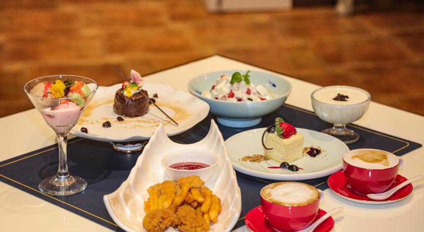 Image of Standard King Room (includes two afternoon teas)Available 2:00-5:00 PM at Manas Western Restaurant on 1st Floor.Valid only on the first day of stay 5