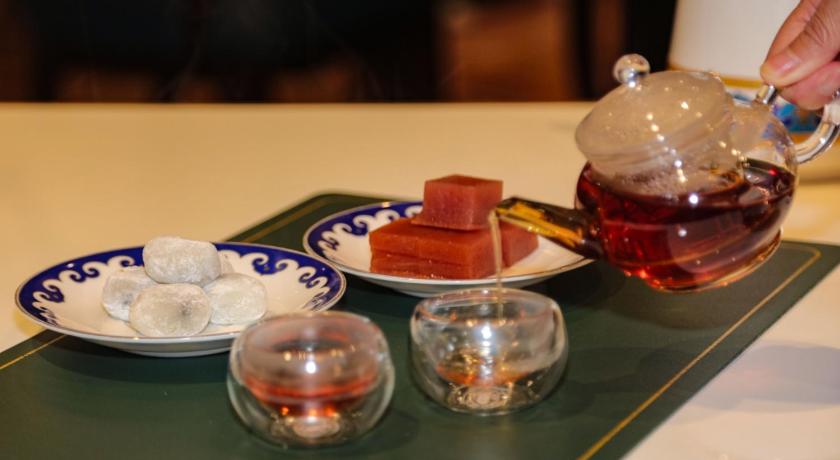 Image of Standard King Room (includes two afternoon teas)Available 2:00-5:00 PM at Manas Western Restaurant on 1st Floor.Valid only on the first day of stay 9