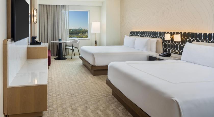 Image of 2 QUEEN BEDS PURE WELLNESS ROOM - POOL VIEW 1