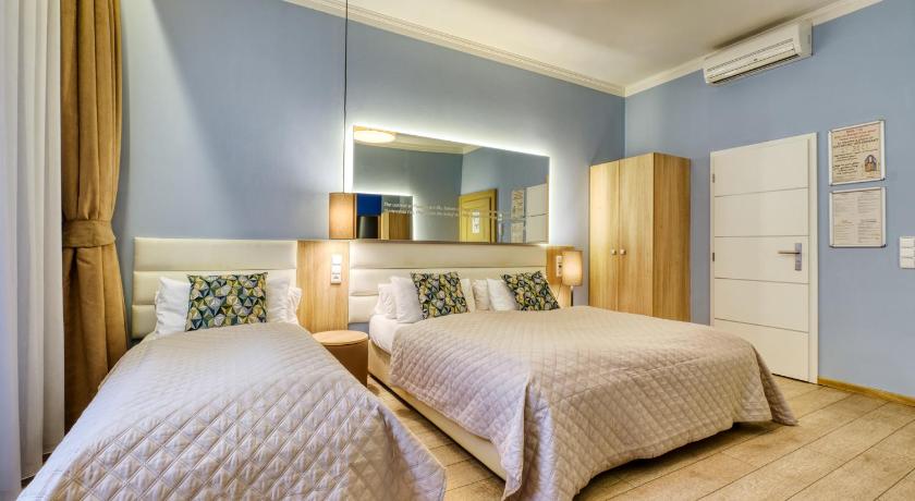 Háromágyas szoba kertre nyíló kilátással (Triple Room with Garden View) fotója 4